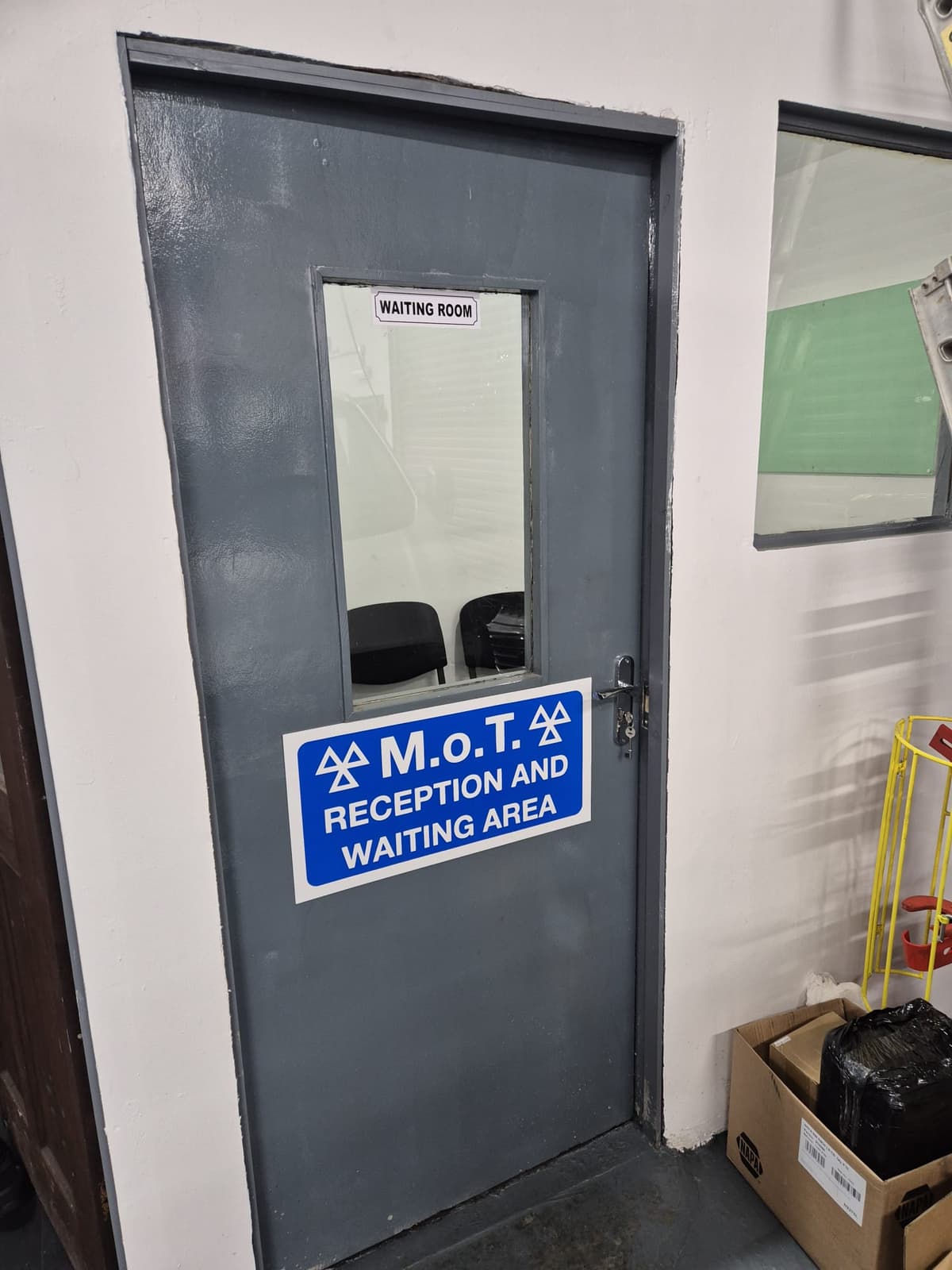 Mechanic working on a car